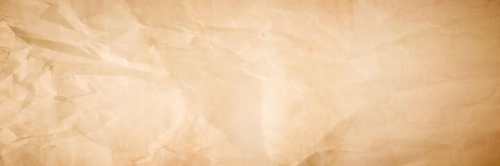 brown crumpled paper texture background. crush paper so that it becomes creased and wrinkled.