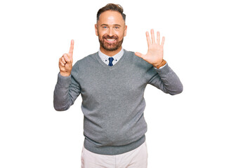 Fototapeta premium Handsome middle age man wearing business clothes showing and pointing up with fingers number six while smiling confident and happy.