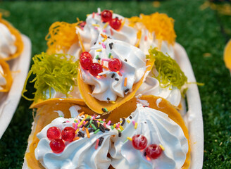 Khanom Buang - Thai traditional dessert, crispy pancake made with cream and toppings