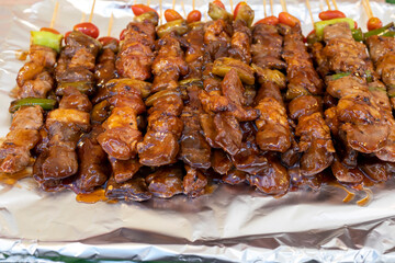 Grilled and marinated beef skewers with chili and tomato, Thai street food