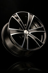 alloy wheel black with a white groove, 6 beams for SUVs and crossovers, close-up on a black background. vertical photo