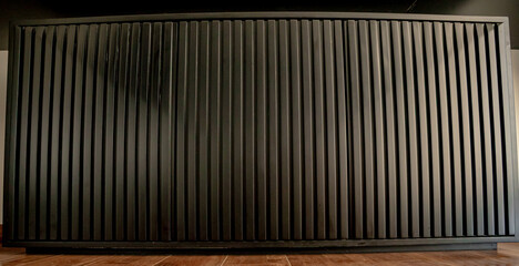 Large black wooden furniture for interiors.