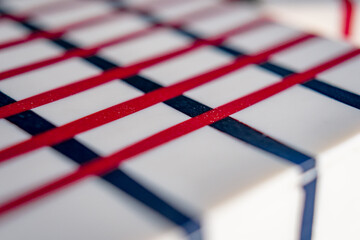 Interior decoration with blue and red stripes in close up concept.