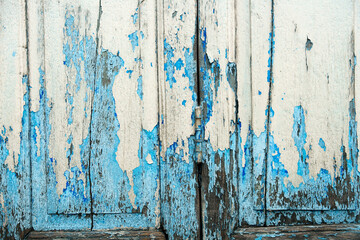 peeling colored folding wooden door
