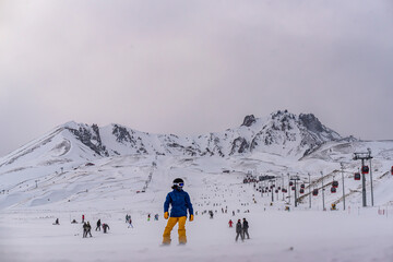 People skiing in Erciyes ski resort. Snowy Mount Erciyes