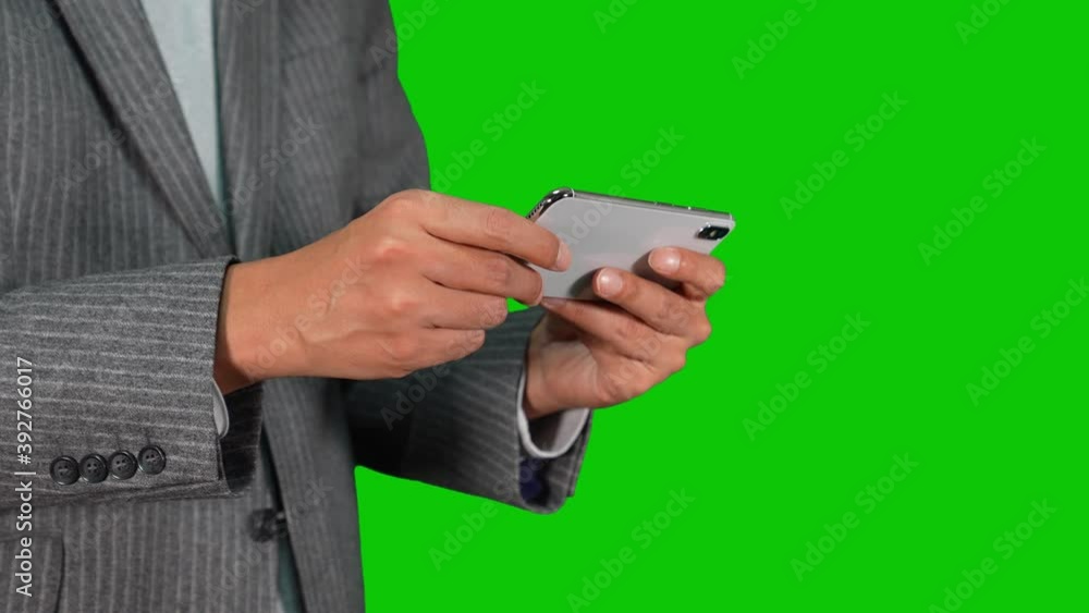 Poster スマホを操作する男性　クロマキー合成用グリーンバック　スローモーション