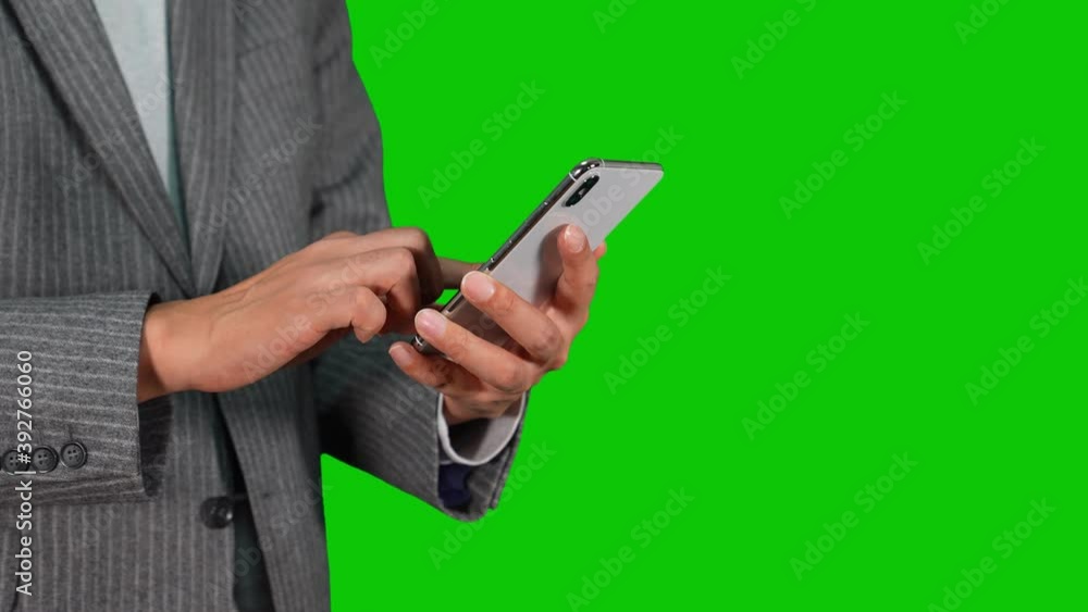 Poster スマホを操作する男性　クロマキー合成用グリーンバック　スローモーション