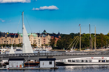 Sailboats and Ships Cruise along the Waters across from the Royal Palace in the Gamla Stan Neighborhood of Stockholm, Sweden