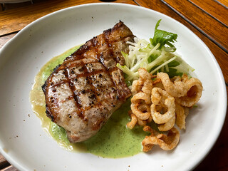 Free range chargrilled pork chop, parsley bagna cauda, apple, lemon & kohlrabi