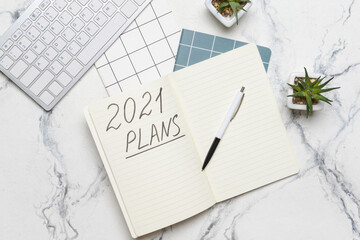 To do list on 2021 year with computer on white background
