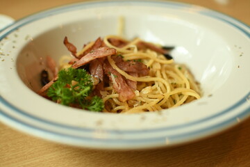 thai style spaghetti white bacon and dry chille 