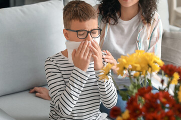 Woman and her son with pollen allergy at home