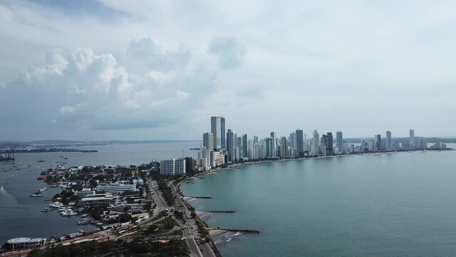 Wide angle  sky line of Cartagena Colombia and costal road by drone.