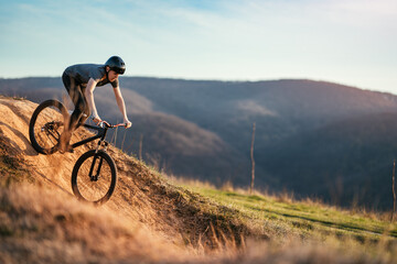 mountain biker on a dusty road