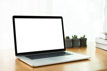 Fototapeta premium Isolated laptop computer screen with clipping path, minimal modern style of workspace at home with laptop computer