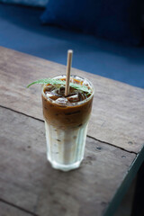 Coffee glass decorated with fern leaf
