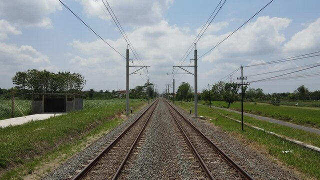 Aerial View of Train Rail with new electronic pole for KRL train in Yogyakarta, Indonesia