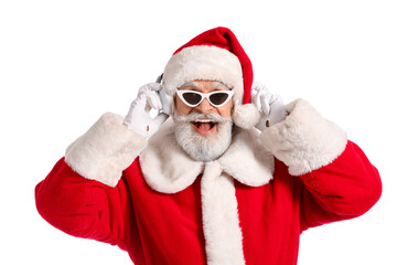 Cool Santa Claus listening to music on white background