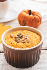 Tasty pumpkin pudding on table