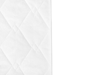 Modern orthopedic mattress on white background, closeup