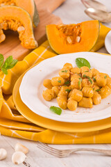 Pumpkin gnocchi with grated amaretti cookies.