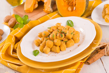 Pumpkin gnocchi with grated amaretti cookies.