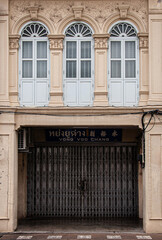 Old Phuket Sino Portuguese house classic facade with stuccowork in Phuket Old town area. Thailand - 392786005