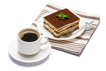 Traditional Italian Tiramisu dessert square portion on ceramic plate and cup of fresh espresso coffee isolated on white background with clipping path