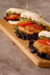 Steamed wheat bun dressed with designer sauce. Vietnamese cuisine concept. Still life. Close-up.