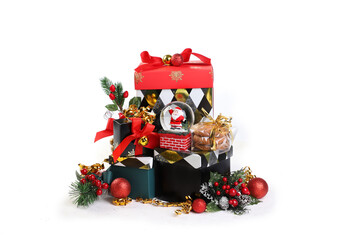 Christmas and new year festive composition. Christmas gifts, Santa Claus in glass ball, winter seasonal decor. greeting holiday background.