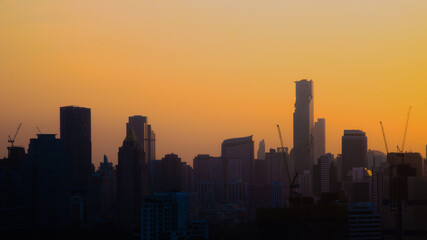 Fototapeta na wymiar silhouette of skyscaraper in business capital area of bangkok