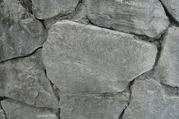 chert and limestone facade. chert and limestone texture on the building wall. 
Natural stone background.