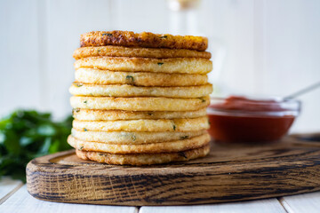 Delicious lunch: corn tortillas on a wooden Board on a white table