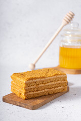 Fototapeta na wymiar selective focus. honey cake with delicate cream