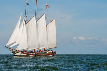 Big Dutch traditional sailing ship on ocean