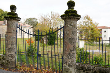 grey retro vintage gate house portal of old traditional european house