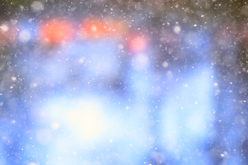 colorful background snow snowfall evening christmas lights, soft light blurry