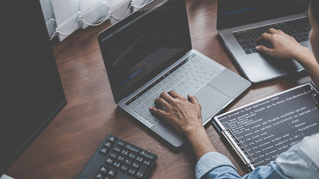Programmer working in a software development and coding technologies. Website design. Technology concept.
