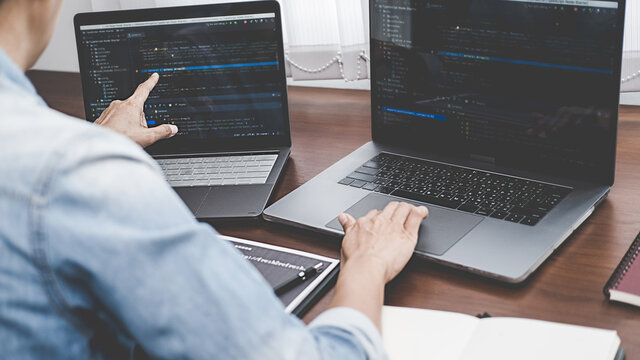 Programmer working in a software development and coding technologies. Website design. Technology concept.