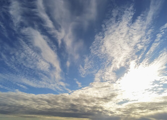 Beautiful white fluffy cloudy sky background,