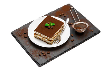Traditional Italian Tiramisu square dessert portion on ceramic plate, strainer and coffee beans on stone serving cutting board isolated on white