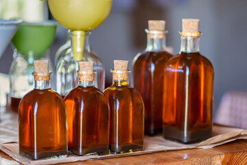 Different types of honey and bottles of honey in the collection workshop