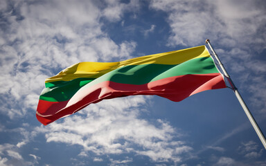 Lithuania national flag waving at sky background close-up.