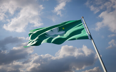 Macau national flag waving at sky background close-up.