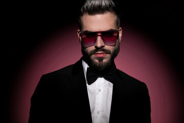 Obraz premium portrait of a sexy fashion businessman wearing an elegant tuxedo