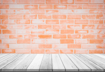 Empty wooden table top on red brick wall background, Design wood terrace white. Perspective for show space for your copy and branding. Can be used as product display montage. Vintage style concept.