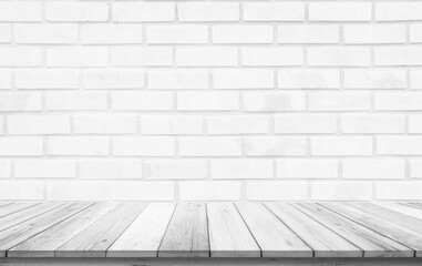 Empty wooden table top on white brick wall background, Design wood terrace white. Perspective for show space for your copy and branding. Can be used as product display montage. Vintage style concept.