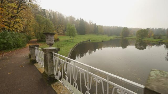 Pavlovsk park in autumn, St. Petersburg, Visconti bridge spanning the Slavianka river
