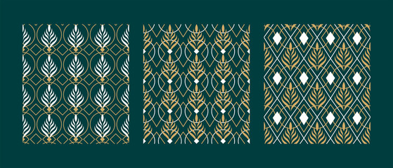 A set of seamless patterns "Golden foliage on an emerald background". Gold and white leaves with geometric shapes.