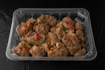 Baked beef or pork goulash in a sauce with onions and bell peppers, ready to eat, vacuum packed....